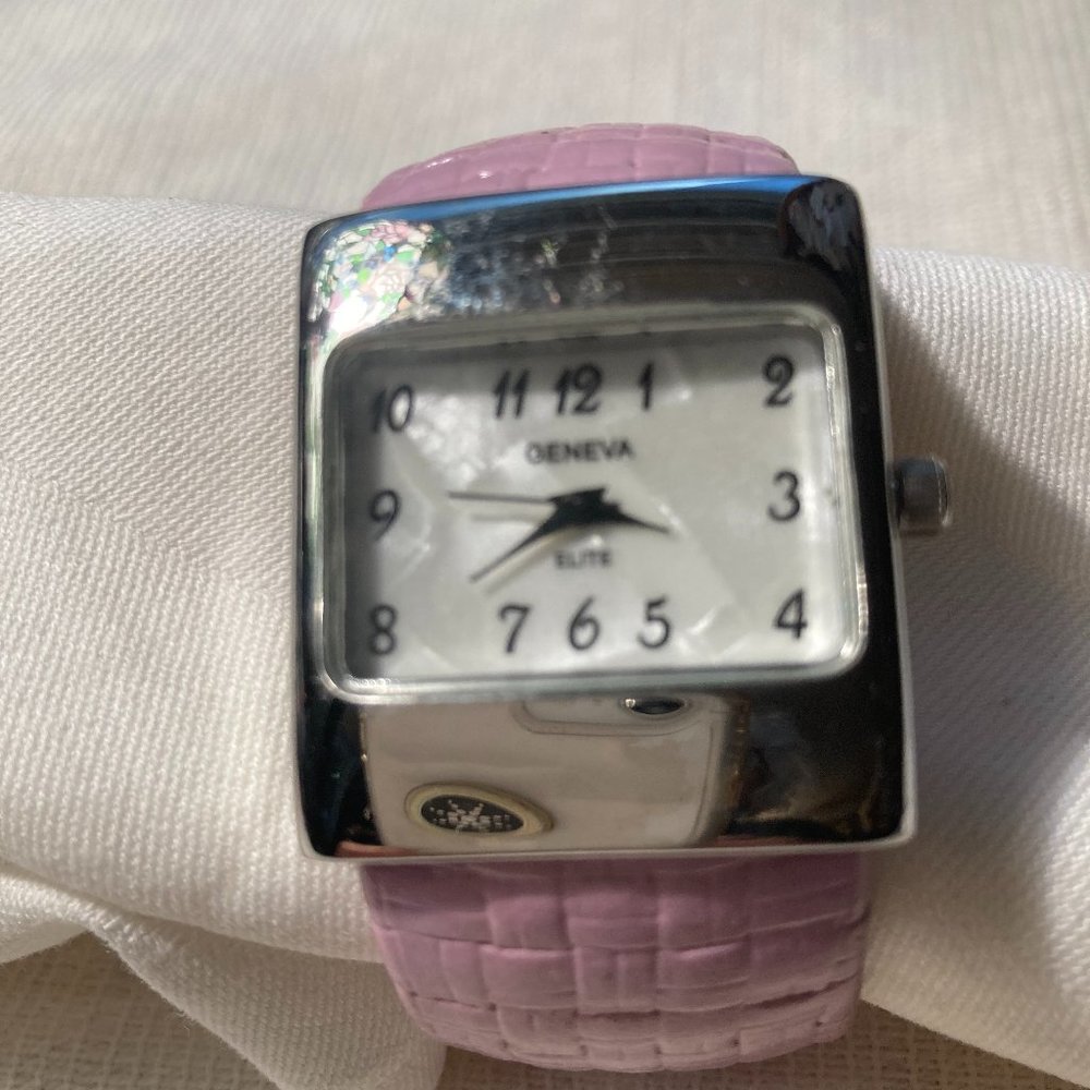 Mint condition Geneva woman's pink cuff watch
